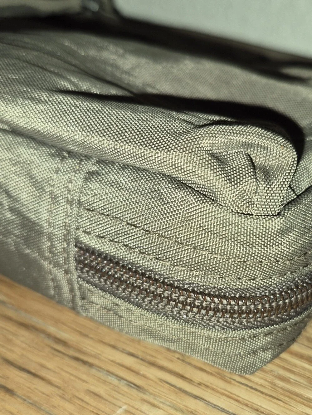 Brown Nylon Baggallini Crossbody bag featuring multiple exterior zipper pockets